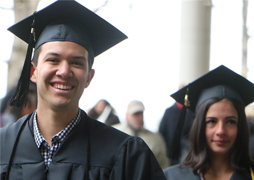 College graduates in cap and gown 